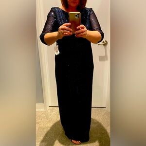 New Elegant, full-length navy sequin gown with 3/4 length sleeves .